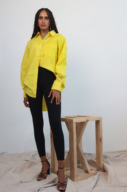 Yellow button down cotton shirt with puff sleeves and cerulean blue trim
